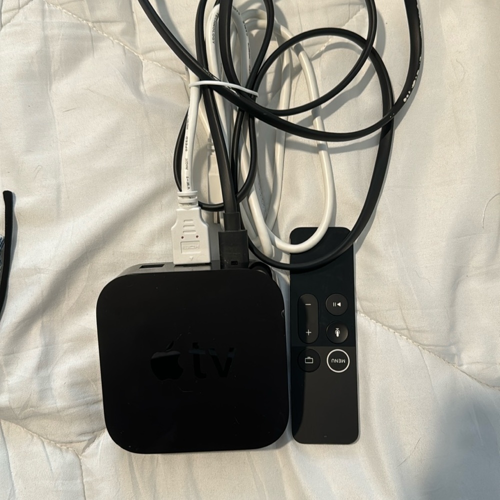 Apple TV with HDMI cable and controller
